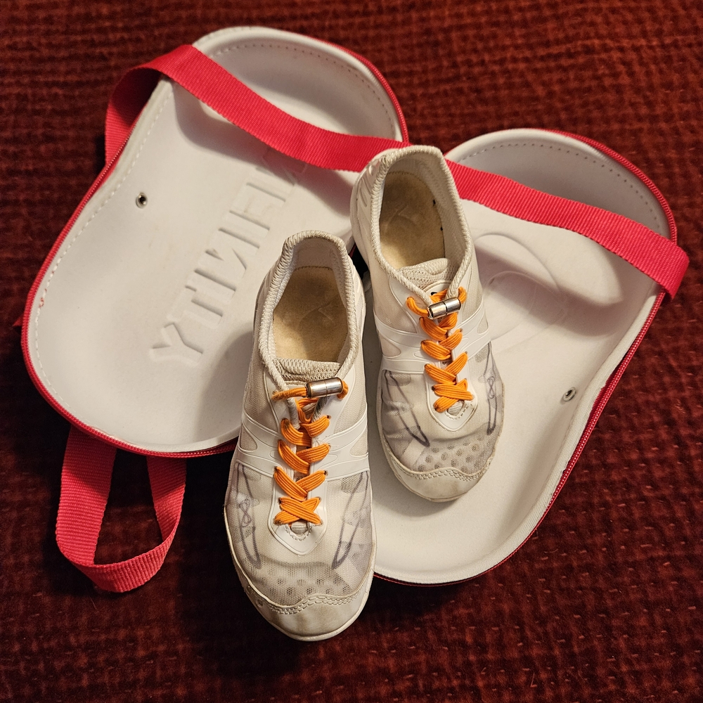 NFINITY White and Orange Low-Top Sneakers Vibrant Design